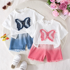 Nuovo Set Casual 2026 per Bambine in Stile Europeo e Americano: Maglietta Bianca con Stampa Animalier a Maniche Corte + Pantaloncini in Denim Rosa Sfumato - Product Image 1