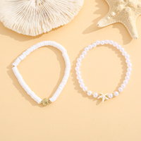 Bracelets tendance avec breloques étoiles de mer et coquillages, perles Heishi blanches imitation nacre, accents dorés, ensemble de bijoux océaniques, idéal pour un cadeau