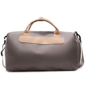 Nouveau sac de sport imperméable de designer avec logo, sac de voyage en cuir PU de haute qualité avec poignée pour le yoga et les sports - Product Image 1