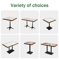 Table de salle à manger rectangulaire moderne en pierre frittée avec pieds en fonte pour restaurants, hôtels, bistrots et cafés - Vente en gros OEM pour commandes en vrac