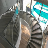 Escalier flottant moderne de luxe PRIMA avec poutre en acier au carbone pour maison et appartement