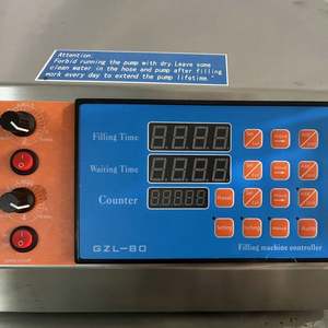 Machine de remplissage de bouteilles en plastique de type table à 4 buses pour produits alcoolisés, shampoings, savons, cosmétiques, boissons, jus d'orange, miel et alcool - Product Image 3