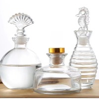 Bouteille d'aromathérapie transparente sérigraphiée de style Ins Diffuseur de roseaux en rotin sans flamme Design Tête de beauté volatile