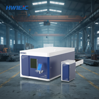 Machine de découpe laser à fibre CNC entièrement fermée avec plateforme d'échange 3015 6025 pour acier inoxydable