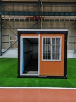 Maison préfabriquée pliable de type X personnalisable avec terrasse et escalier pour usage en appartement