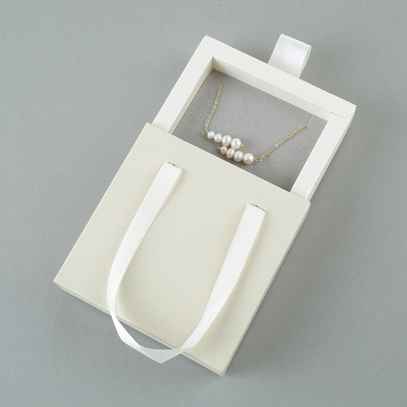 Boîte beige avec mousse