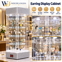 Vitrine rotative sur pied en acrylique transparent à deux niveaux avec éclairage LED pour cosmétiques, parfums, lunettes et modèles dentaires