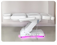 Table de massage électrique de luxe à 3/4 moteurs pour salon de beauté et spa, avec lumière d'ambiance et commande au pied