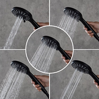Système de douche thermostatique mural noir mat en laiton avec mitigeur double poignée et douchette à main pour salle de bain
