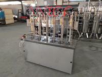 Machine de remplissage de bouteilles et de canettes pour boissons gazeuses, boissons énergisantes, sodas, eau gazeuse, jus, boissons gazeuses