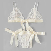 Starwin OEM&ODM Ensemble de lingerie sexy exotique en dentelle à trois points, 2 pièces, en spandex fin, avec nœuds mignons pour femmes