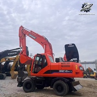 Vente Flash : Excavatrice sur pneus Doosan DH210 d'occasion, 21 tonnes, système hydraulique complet, bon état, livraison rapide, expédition mondiale