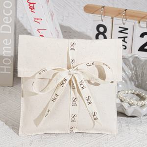 Sac de rangement pour vêtements de bébé en toile de coton réutilisable avec ruban, sac à poussière en coton imprimé à l'écran personnalisé - Product Image 1