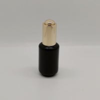 Emballage cosmétique de bouteille de pompe en verre de haute qualité 30ml bouteille ronde de fond en verre noir brillant bouteille d'huile avec pompe à lotion