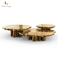 Table basse de luxe moderne haut de gamme Sculpture miroir doré Table basse de salon en acier inoxydable pour villa