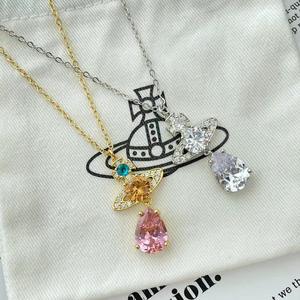 Cadena de Clavícula para Mujer, Diseño de Mariposa y Saturno con Circones de Alta Calidad, Chapada en Oro, Joyería de Moda al por Mayor - Product Image 1