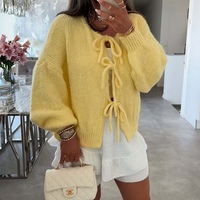 Vente en gros Nouveau design Cardigan pour femme Couleur unie avec de jolies manches de lanterne Pull à cordon anti-rides