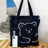 Élégante trousse à crayons en toile avec sangle et fermeture éclair, style frais et doux, sac bandoulière polyvalent pour femme, collection Hiver 2024
