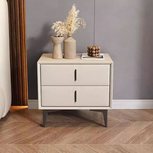 Mesita de Noche Denlais Color Blanco Hueso, Gabinete Moderno para Dormitorio con 2 Cajones y Ruedas - Product Image 1