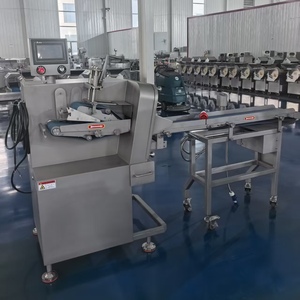 Trancheuse continue modèle 160, conçue pour la découpe continue à grande vitesse de viande crue et cuite avec épaisseur de coupe réglable - Product Image 2
