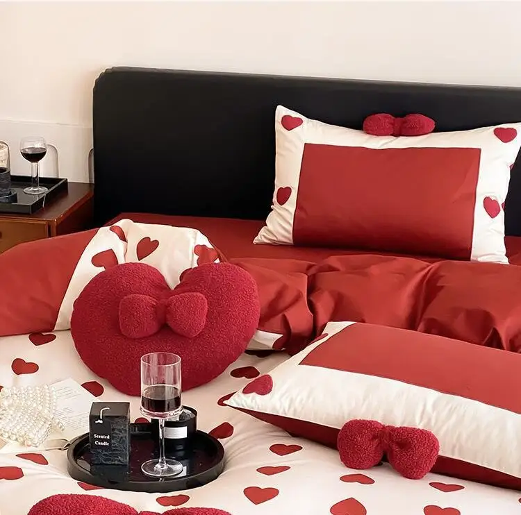Ensemble de quatre pièces de célébration de mariage en coton à longues fibres haut de gamme pour draps de lit rouges housses de couette