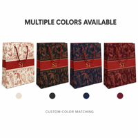 Sacs en papier kraft perforés de luxe personnalisés et recyclables avec poignée en corde de coton et pelliculage mat pour magasins de vêtements et cadeaux