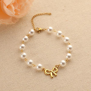 Elegant Glass <strong>Pearl</strong> <strong>Necklace</strong> and Bracelet Set Women Vintage Gold Bow <strong>Pendant</strong> Jewelry Handmade Design for Party - Product Image 3