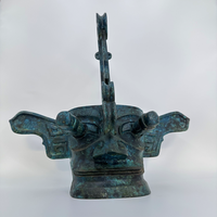 Sanxingdui Bronze tête humaine couronne artefact mis au jour caractéristiques culturelles artistiques uniques ruines artisanat en métal distingué
