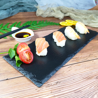 Assiette rectangulaire en ardoise noire avec motif de fromage à steak gravé pour décor de Noël au restaurant ou assiette en pierre Wajila pour la maison