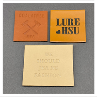 Étiquettes en cuir personnalisées en gros pour jeans et casquettes de camionneur, avec logo gaufré et thermocollant, directement de l'usine