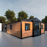 Maison conteneur modulaire extensible de 20 pieds à construction rapide, en panneaux sandwich, préfabriquée, pour camping, mini-maison, bureau, hôtels, centres commerciaux, design moderne
