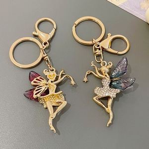 New Metal Diamond Dance Wings Girl Keychain High End Accessories Bag Pendant Car Keyring Small Jewelry <b>Key</b> <b>Chain</b> - Product Image 4