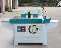 Machine à bois pour menuiserie, avec table coulissante, pour le façonnage vertical de meubles en bois, à broche simple, pour le fraisage et le moulage