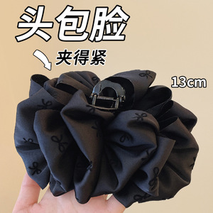 High-end black bubble <b>bow</b> hair <b>clip</b> for women with voluminous hair, perfect for updos. - Product Image 4