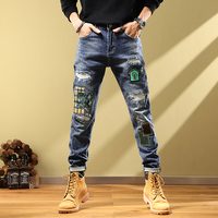 Nouveau pantalon décontracté en jean pour homme 2024, coupe droite, imprimé graffiti artistique, style streetwear, effet usé urbain, collection automne