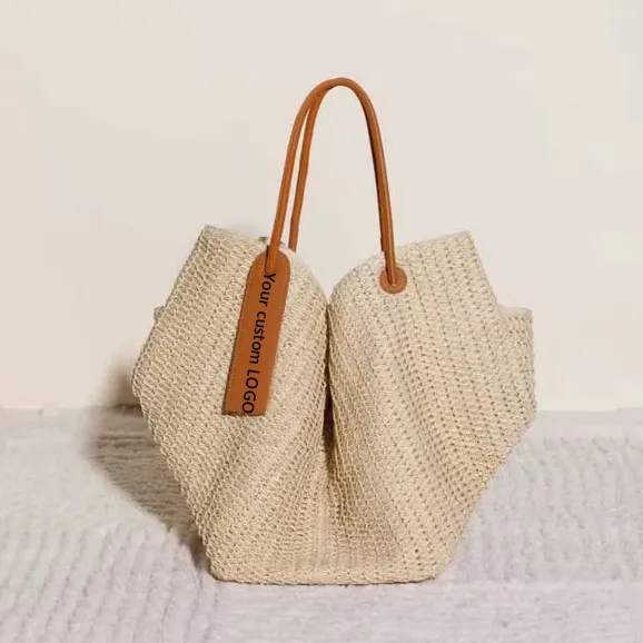 Nouvelle mode grande capacité crochet sacs à main sac à main femmes paille sac de plage sac fourre-tout avec poignée en cuir