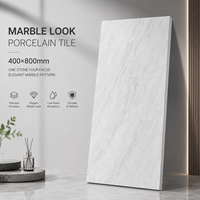 Carrelage mural en porcelaine effet marbre brillant 400x800mm, épaisseur 10mm, pour projets hôteliers et commerciaux modernes, finition un seul bloc quatre faces, directement de l'usine