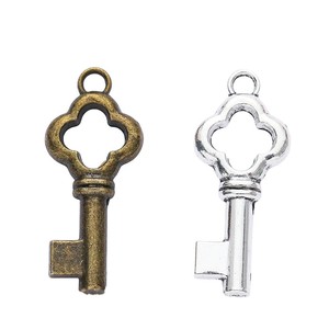 Pendentif porte-clés squelette découpé en forme <span class=keywords><strong>de</strong></span> feuille porte-bonheur, en alliage <span class=keywords><strong>de</strong></span> bronze antique, style vintage, pour décoration <span class=keywords><strong>de</strong></span> broche <span class=keywords><strong>de</strong></span> chapeau steampunk - Product Image 2
