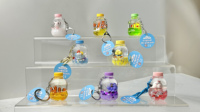 Porte-clés en acrylique avec bouteille flottante en forme de voilier bleu océan, dessin animé, exquis, cadeau pour enfants, injection d'huile liquide, bouteille à la dérive, vente en gros