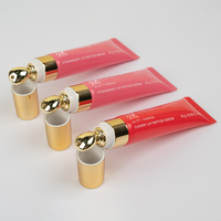 Emballage vide d'huile pour les lèvres de 10ml 20ml de cosmétiques avec tête en céramique Tube de compression de brillant à lèvres Logo personnalisé Tuyaux de crème pour les yeux en plastique