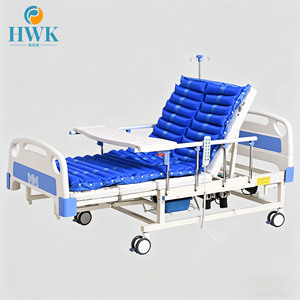 Cama de enfermería manual totalmente plegable con material personalizado, mesa de comedor, colchón de rejilla, ruedas bloqueables para rehabilitación de pacientes postrados - Product Image 1