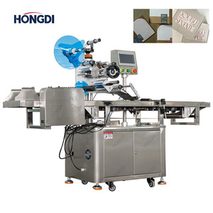 Machine d'étiquetage automatique de haute précision pour bouteilles et boîtes plates - Product Image 2