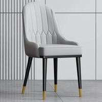 Chaises de salle à manger en cuir rembourrées à haut prix avec cadre en métal