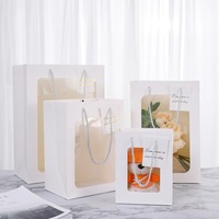 Großhandel Maßgefertigte Blumen-Geschenktüte Verpackung Recycelbare Tragbare Blumenstrauß-Handtasche Einkaufspapiertüte mit Klarsichtfenster