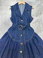 Robe midi décontractée rétro en denim uni sans manches, nouvelle collection automne/hiver 2025, vêtements pour femmes, col à revers, ceinture, bouton simple