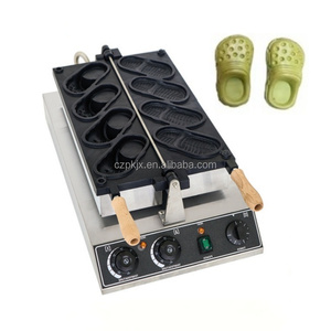 Machine à gaufres de pantoufles électriques antiadhésives à usage commercial/Machine de fabrication de gâteaux de pantoufles/<span class=keywords><strong>prix</strong></span> de la Machine de cuisson de pain en forme de chaussures - Product Image 2