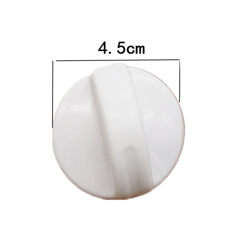 White knob on washing machine