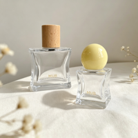 Flacon pulvérisateur de parfum en verre transparent à fond épais, flacon de parfum vide avec bouchon à bille, impression personnalisée du logo pour l'emballage de parfum