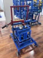 Machines à fabriquer des briques manuelles mobiles de type poussée 2-45A, équipement motorisé pour blocs de béton avec compatibilité 220V/380V