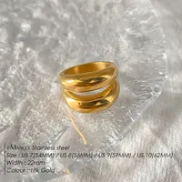 Bague élégante eManco à double boucle en acier inoxydable plaqué or PVD - Bijou délicat hypoallergénique sans nickel pour femme